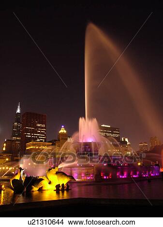Picture -  Chicago, IL, Illinois, Windy City, Downtown, Grant Park, Buckingham Memorial Fountain, illuminated, evening. Fotosearch