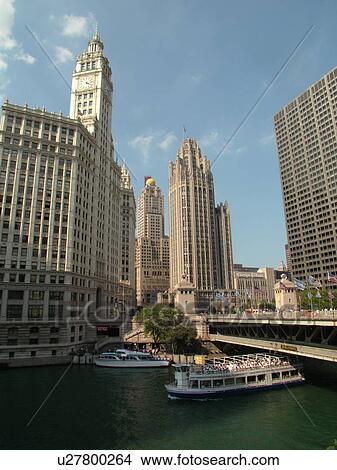 Chicago, IL, Illinois, Windy City, Downtown, skyline, Michigan Avenue, Wrigley Building, Tribune Tower, sightseeing tour boat, Chicago River View Large Photo Image Picture - Chicago, IL, Illinois, Windy City, Downtown, skyline, Michigan Avenue, Wrigley Building, Tribune Tower, sightseeing tour boat, Chicago River. Fotosearch