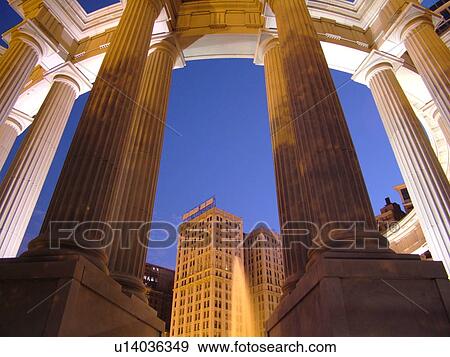 Stock Photo -  Chicago, IL, Illinois, Windy City, Downtown, skyline, Millennium Park, Wrigley Square, Millennium Monument, semi-circular row of peristyle columns, evening. Fotosearch