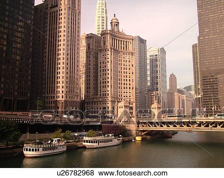 Stock Photo -  Chicago, IL, Illinois, Windy City, Downtown, skyline, Michigan Avenue Bridge, sightseeing tour boats, Chicago River. Fotosearch