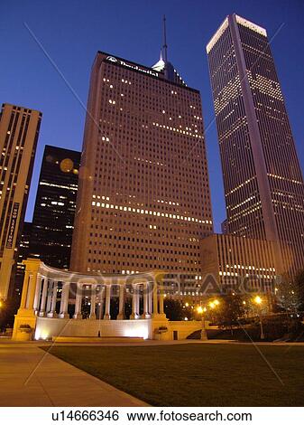 Chicago, IL, Illinois, Windy City, Downtown, skyline, Millennium Park, Wrigley Square, Millennium Monument, semi-circular row of peristyle columns, evening View Large Photo Image Stock Photograph - Chicago, IL, Illinois, Windy City, Downtown, skyline, Millennium Park, Wrigley Square, Millennium Monument, semi-circular row of peristyle columns, evening. Fotosearch
