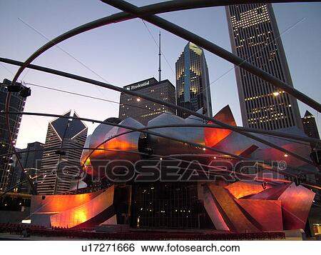 Stock Photograph -  Chicago, IL, Illinois, Windy City, Downtown, skyline, Millennium Park, Jay Pritzker Pavilion, designed by Frank Gehry, Great Lawn, evening. Fotosearch