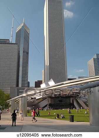 Stock Photography -  Chicago, IL, Illinois, Windy City, Downtown, skyline, Millennium Park, Jay Pritzker Pavilion, designed by Frank Gehry, Great Lawn. Fotosearch