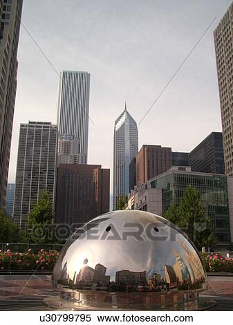 Stock Photography -  Chicago, IL, Illinois, Windy City, Downtown, skyline, stainless steel fountain. Fotosearch