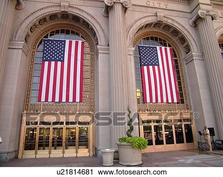 Stock Image -  Cleveland, OH, Ohio, Downtown, Union Station, Tower City Center, Ritz-Carlton Hotel, The Avenue, American Flags . Fotosearch