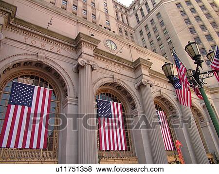 Stock Photo -  Cleveland, OH, Ohio, Downtown, Union Station, Tower City Center, Ritz-Carlton Hotel, The Avenue, American Flags . Fotosearch