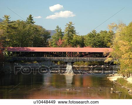 Stock Photo -  Conway, NH, New Hampshire, White Mountains, Saco River, Covered Bridge. Fotosearch