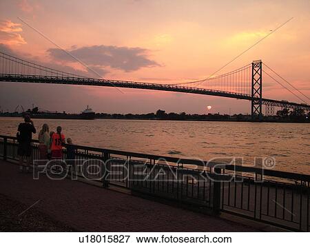 Detroit, MI, Michigan, Detroit River, Windsor, Ontario, Canada, Ambassador Bridge, sunset View Large Photo Image Stock Photo - Detroit, MI, Michigan, Detroit River, Windsor, Ontario, Canada, Ambassador Bridge, sunset. Fotosearch