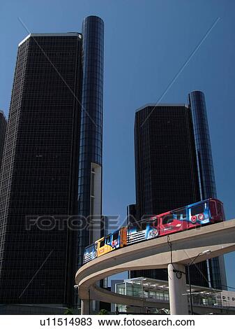 Stock Image -  Detroit, MI, Michigan, Motor City, Downtown, skyline, General Motors Headquarters, Renaissance Center, Detroit People Mover, aerial trolley, elevated light-rail system. Fotosearch