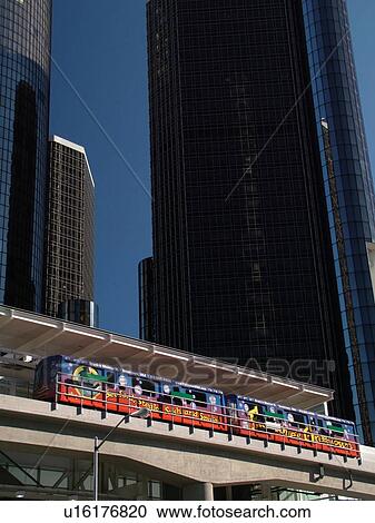 Stock Image -  Detroit, MI, Michigan, Motor City, Downtown, skyline, General Motors Headquarters, Renaissance Center, Detroit People Mover, aerial trolley, elevated light-rail system. Fotosearch