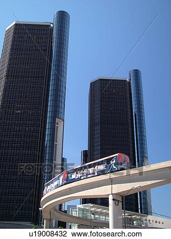 Stock Image -  Detroit, MI, Michigan, Motor City, Downtown, skyline, General Motors Headquarters, Renaissance Center, Detroit People Mover, aerial trolley, elevated light-rail system. Fotosearch