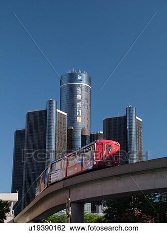 Stock Image -  Detroit, MI, Michigan, Motor City, Downtown, skyline, General Motors Headquarters, Renaissance Center, Detroit People Mover, aerial trolley, elevated light-rail system. Fotosearch