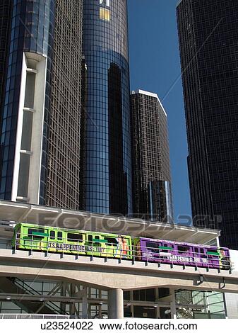 Stock Image -  Detroit, MI, Michigan, Motor City, Downtown, skyline, General Motors Headquarters, Renaissance Center, Detroit People Mover, aerial trolley, elevated light-rail system. Fotosearch