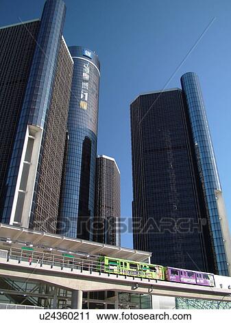Stock Image -  Detroit, MI, Michigan, Motor City, Downtown, skyline, General Motors Headquarters, Renaissance Center, Detroit People Mover, aerial trolley, elevated light-rail system. Fotosearch