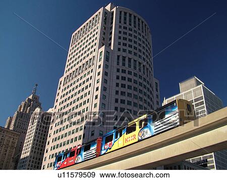 Detroit, MI, Michigan, Motor City, Downtown, skyline, Detroit People Mover, aerial trolley, elevated light-rail system View Large Photo Image Stock Photo - Detroit, MI, Michigan, Motor City, Downtown, skyline, Detroit People Mover, aerial trolley, elevated light-rail system. Fotosearch