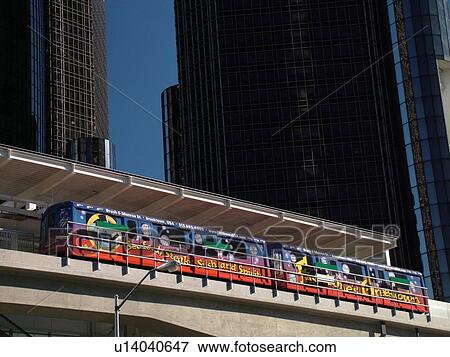 Detroit, MI, Michigan, Motor City, Downtown, skyline, General Motors Headquarters, Renaissance Center, Detroit People Mover, aerial trolley, elevated light-rail system View Large Photo Image Stock Photo - Detroit, MI, Michigan, Motor City, Downtown, skyline, General Motors Headquarters, Renaissance Center, Detroit People Mover, aerial trolley, elevated light-rail system. Fotosearch