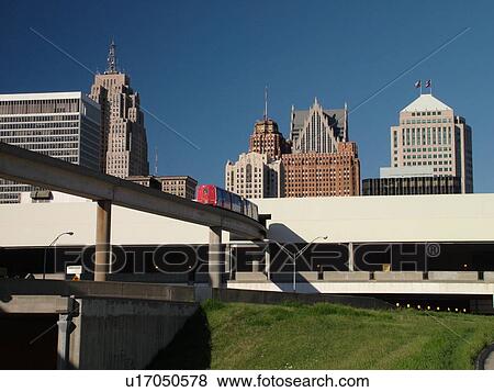 Stock Photo -  Detroit, MI, Michigan, Motor City, Downtown, skyline, Detroit People Mover, aerial trolley, elevated light-rail system, Cobo Conference/Exhibition Center. Fotosearch