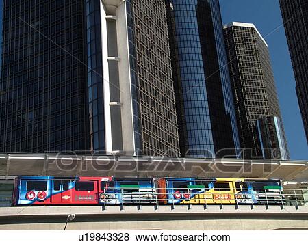 Stock Photo -  Detroit, MI, Michigan, Motor City, Downtown, skyline, General Motors Headquarters, Renaissance Center, Detroit People Mover, aerial trolley, elevated light-rail system. Fotosearch