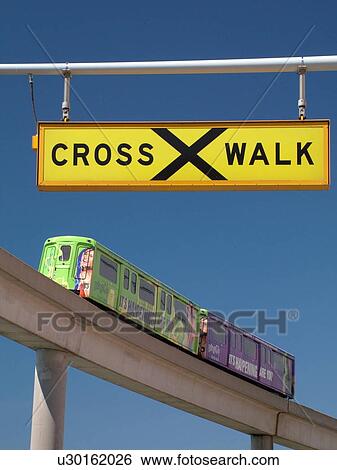 Detroit, MI, Michigan, Motor City, Downtown, skyline, Detroit People Mover, aerial trolley, elevated light-rail system, crosswalk sign View Large Photo Image Stock Photograph - Detroit, MI, Michigan, Motor City, Downtown, skyline, Detroit People Mover, aerial trolley, elevated light-rail system, crosswalk sign. Fotosearch