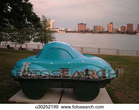 Stock Photo -  Detroit, MI, Michigan, Riverfront, Detroit River, CarTunes on Parade statue. Fotosearch