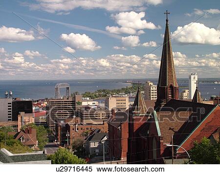 Stock Photography -  Duluth, MN, Minnesota, Aerial of downtown Duluth and Duluth Harbor along Lake Superior.. Fotosearch