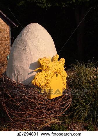 Stock Image -  Egg Harbor, WI, Wisconsin, Large egg in a bird nest mailbox, humorous, Dovetail Gallery and Studio. Fotosearch
