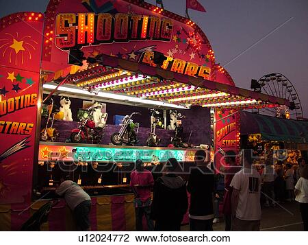 Essex Junction, VT, Vermont, Champlain Valley Fair, Shooting Stars game on the Midway, evening View Large Photo Image Stock Image - Essex Junction, VT, Vermont, Champlain Valley Fair, Shooting Stars game on the Midway, evening. Fotosearch
