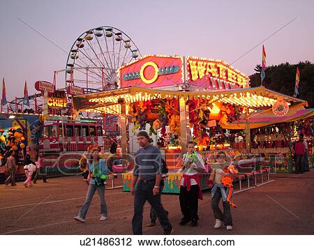 Stock Image -  Essex Junction, VT, Vermont, Champlain Valley Fair, evening. Fotosearch