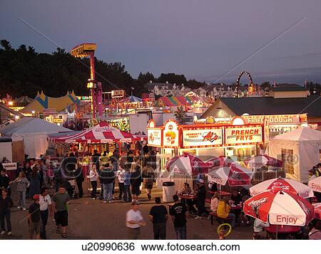 Essex Junction, VT, Vermont, Champlain Valley Fair, crowd of people walking on the Midway, evening View Large Photo Image Stock Photograph - Essex Junction, VT, Vermont, Champlain Valley Fair, crowd of people walking on the Midway, evening. Fotosearch