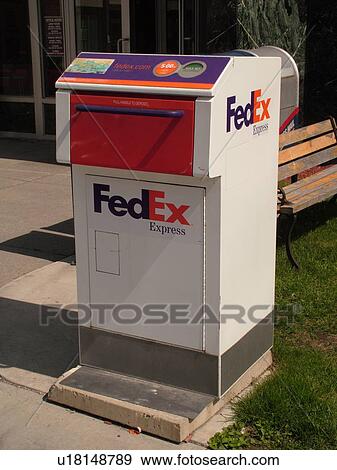 Stock Photo -  FeEx drop box, Federal Express. Fotosearch