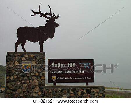 Stock Image -  Fort Totten, ND, North Dakota, Sullys Hill, Sully's Hill National Game Preserve, entrance sign. Fotosearch