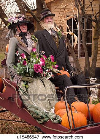 Frelighsburg, Canada, QC, Quebec, Fall decoration, Eastern Township, St Lawrence Valley, manikins dressed in old fashioned clothes sitting in a buggy View Large Photo Image Stock Photo - Frelighsburg, Canada, QC, Quebec, Fall decoration, Eastern Township, St Lawrence Valley, manikins dressed in old fashioned clothes sitting in a buggy. Fotosearch