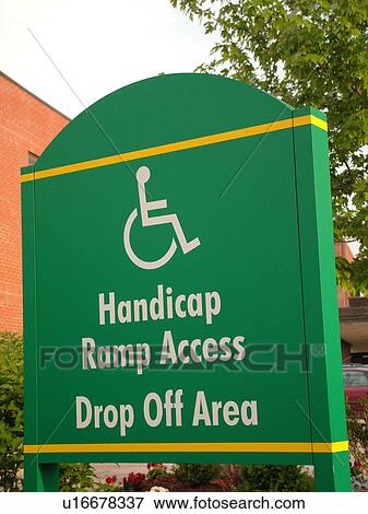 Stock Photo -  handicap sign, handicap ramp access, Drop Off Area, . Fotosearch