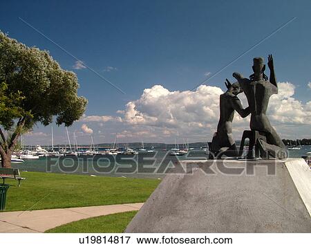 Stock Photo -  Harbor Springs, MI, Michigan, Lake Michigan, City Park, lakefront, marina, statue. Fotosearch