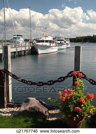Stock Photograph -  Harbor Springs, MI, Michigan, Lake Michigan, marina, pier, dock, boats. Fotosearch
