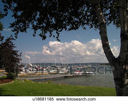 Stock Photography -  Harbor Springs, MI, Michigan, Lake Michigan, City Park, lakefront, marina. Fotosearch