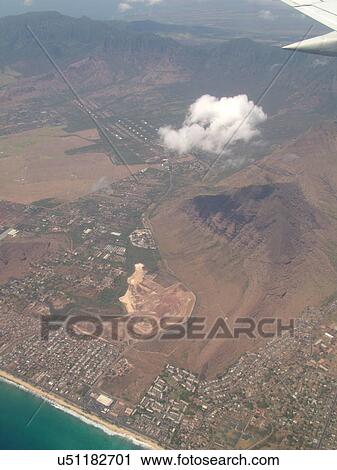 Stock Image -  HI, Hawaii, Pacific Ocean, Aloha Airlines, Inter-Island flight, aerial of Western Oahu. Fotosearch