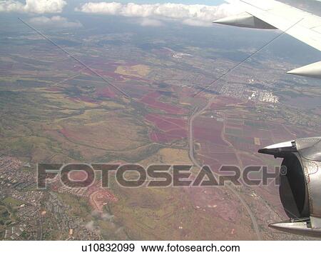 Stock Photo -  HI, Hawaii, Pacific Ocean, Aloha Airlines, Inter-Island flight, aerial of Western Oahu. Fotosearch