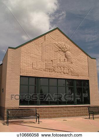 Hillsboro, ND, North Dakota, I-29 Visitor Center Rest Area, relief sculpture of train on building View Large Photo Image Stock Photo - Hillsboro, ND, North Dakota, I-29 Visitor Center Rest Area, relief sculpture of train on building. Fotosearch