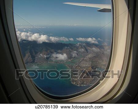 Stock Photo -  Honolulu, Oahu, HI, Hawaii, aerial, eastern Oahu, view from plane's window. Fotosearch