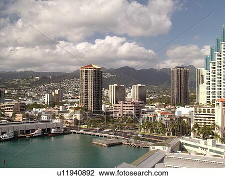 Stock Image -  Honolulu, Oahu, HI, Hawaii, Downtown, skyline, high-rise buildings, aerial. Fotosearch