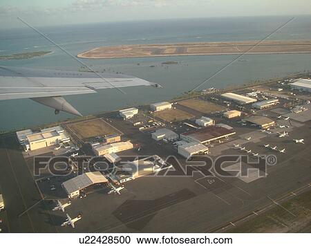 Stock Image -  Honolulu, Oahu, HI, Hawaii, Honolulu International airport, hub, aerial. Fotosearch