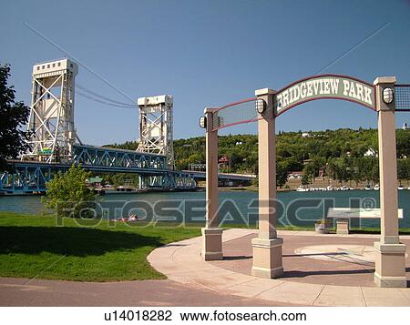 Stock Image -  Houghton/Hancock, MI, Michigan, Portage Lift Bridge, Portage Lake, Bridgeview Park. Fotosearch