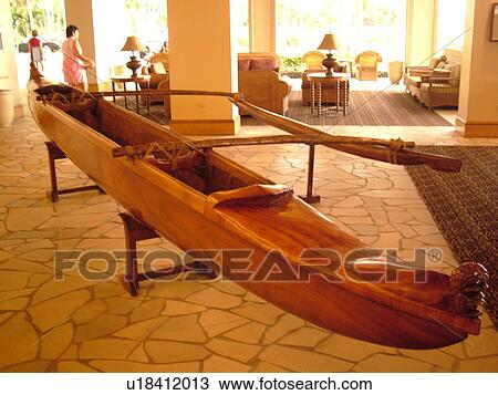 Stock Image -  Keauhou, Big Island, Island of Hawaii, HI, Hawaii, Kona Coast, Keauhou Beach Resort, ancient outrigger canoe, lobby. Fotosearch