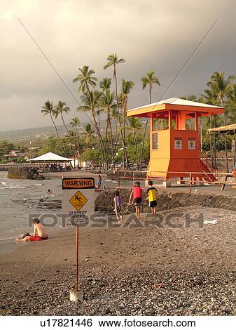 Stock Photograph -  Keauhou, Big Island, Island of Hawaii, HI, Hawaii, Kona Coast, Kahaluu beach, warning sign, lifeguard hut. Fotosearch