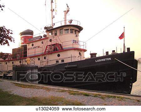 Stock Photo -  Kewaunee, WI, Wisconsin, Lake Michigan, tugboat. Fotosearch