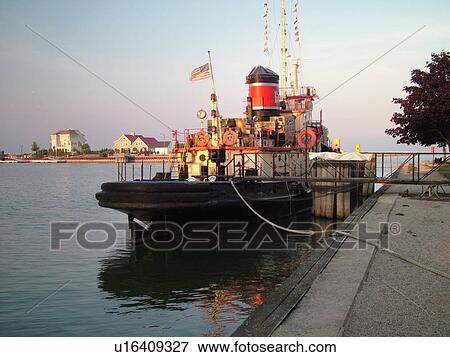 Stock Photo -  Kewaunee, WI, Wisconsin, Lake Michigan, tugboat. Fotosearch
