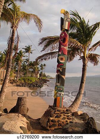 Stock Image -  Kihei, Maui, HI, Hawaii, Captain Vancouver Monument, totem pole. Fotosearch