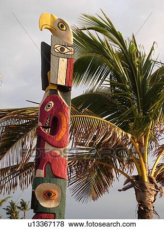 Stock Photo -  Kihei, Maui, HI, Hawaii, Captain Vancouver Monument, totem pole. Fotosearch