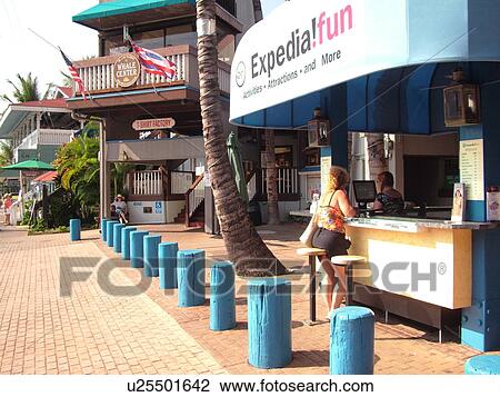 Stock Image -  Lahaina, Maui, HI, Hawaii, downtown, The Wharf, information kiosk. Fotosearch